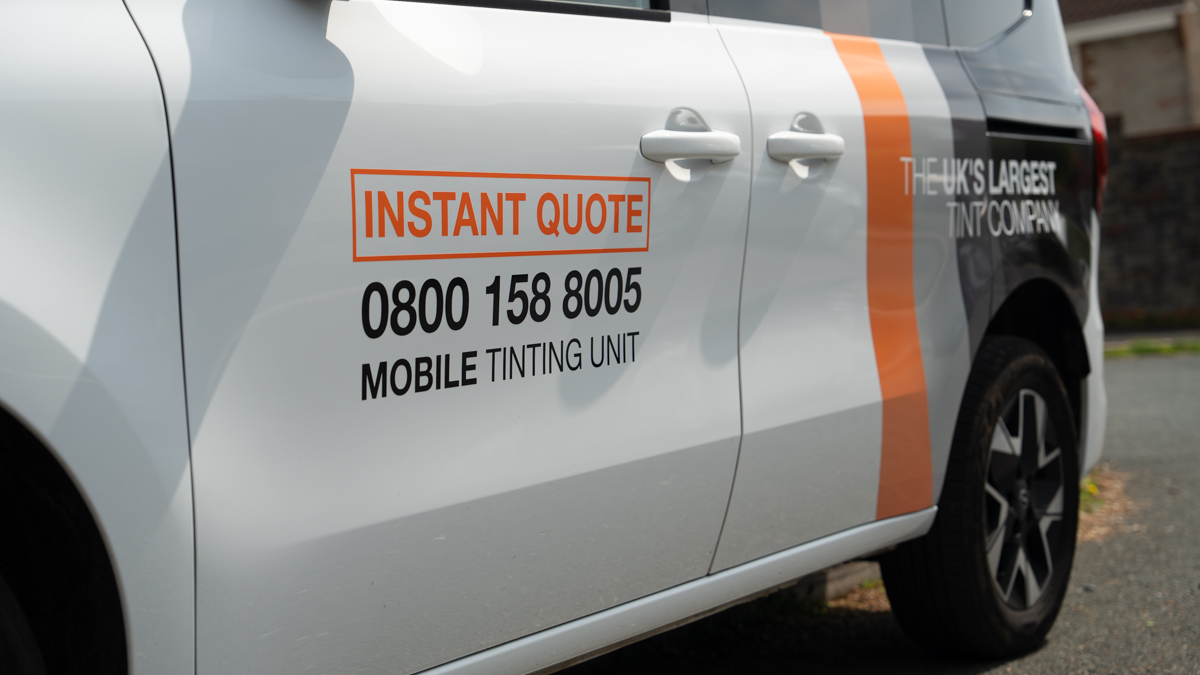 Mobile Tinting Technician from Leek Working On-Site